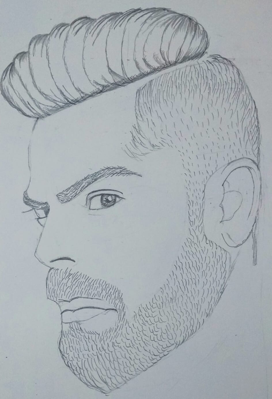 My submission for Art competition, a realistic pencil portrait drawing of Virat  Kohli by me. : r/delhi